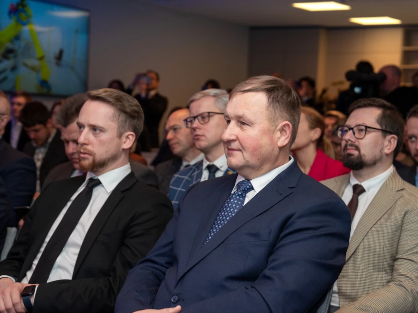 Arvydas Paukštys listening in conference